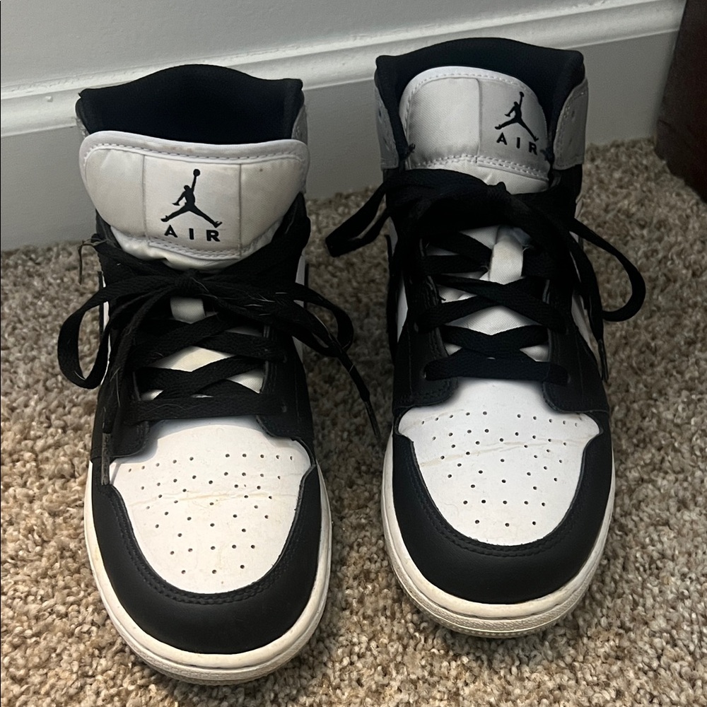 Air Jordan Black and White Sneakers
6.5Y